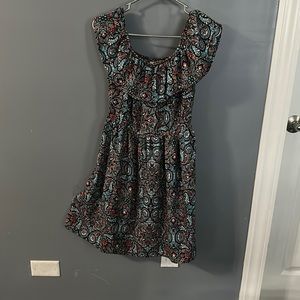 This dress is very comfortable. Blue, red some orange and pink pattern.